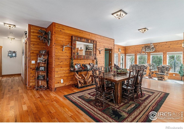 9512 County Road 43, Glen Haven, CO 80532 - dining room with wood finished floors and wood walls