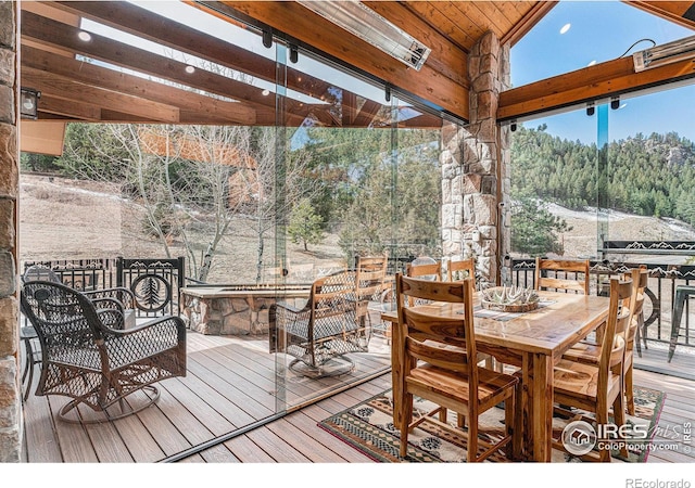 9512 County Road 43, Glen Haven, CO 80532 - wooden deck featuring outdoor dining space