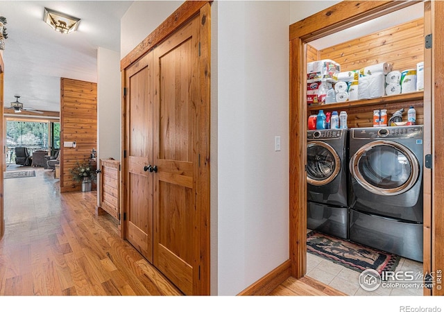 9512 County Road 43, Glen Haven, CO 80532 - clothes washing area featuring washer and dryer, a ceiling fan, light wood-style flooring, and laundry area