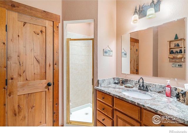 9512 County Road 43, Glen Haven, CO 80532 - bathroom featuring a shower stall and vanity