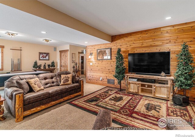 9512 County Road 43, Glen Haven, CO 80532 - living area featuring recessed lighting, carpet flooring, wood walls, and visible vents