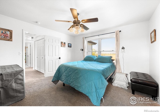 bedroom with carpet, ceiling fan, and access to outside