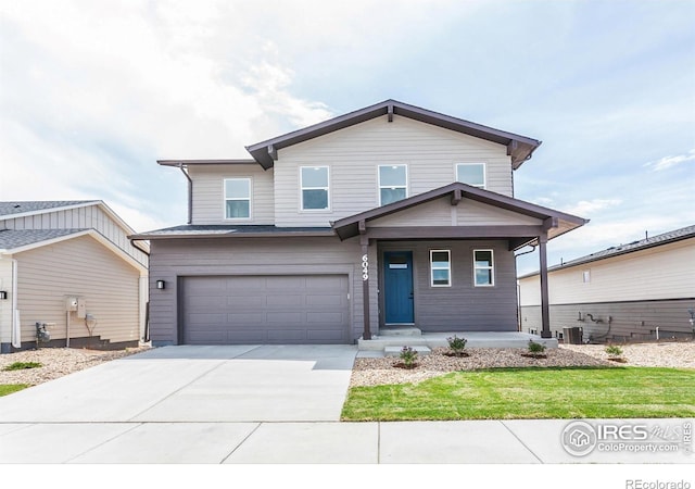 6049 Saddle Horn Dr, Timnath, CO 80547 - view of front of property featuring a garage, concrete driveway, a porch, and central AC