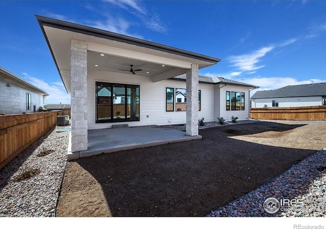 rear view of property with a ceiling fan, a patio, a fenced backyard, and cooling unit