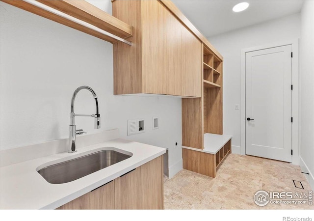 laundry room with cabinet space and washer hookup