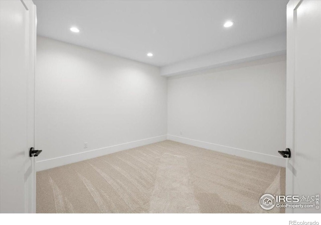 basement with recessed lighting, carpet flooring, and baseboards