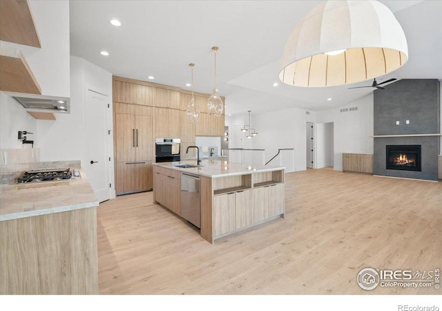 kitchen with light brown cabinets, appliances with stainless steel finishes, modern cabinets, recessed lighting, and ceiling fan