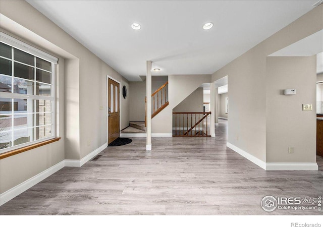 660 Fernglen Ct, Colorado Springs, CO 80906 - interior space featuring recessed lighting, stairway, baseboards, and wood finished floors