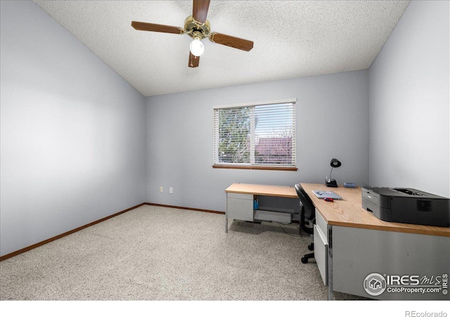 660 Fernglen Ct, Colorado Springs, CO 80906 - office area with baseboards, a textured ceiling, a ceiling fan, and vaulted ceiling