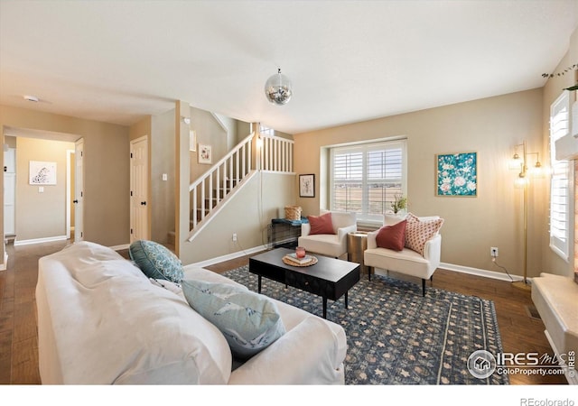 2120 Timber Creek Dr Unit 3, Fort Collins, CO 80528 - living room with baseboards, stairs, and wood finished floors