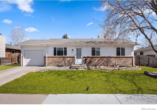 ranch-style home featuring fence, a garage, concrete driveway, brick siding, and a front lawn