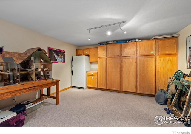 2418 Maplewood Cir E, Longmont, CO 80503 - garage with freestanding refrigerator