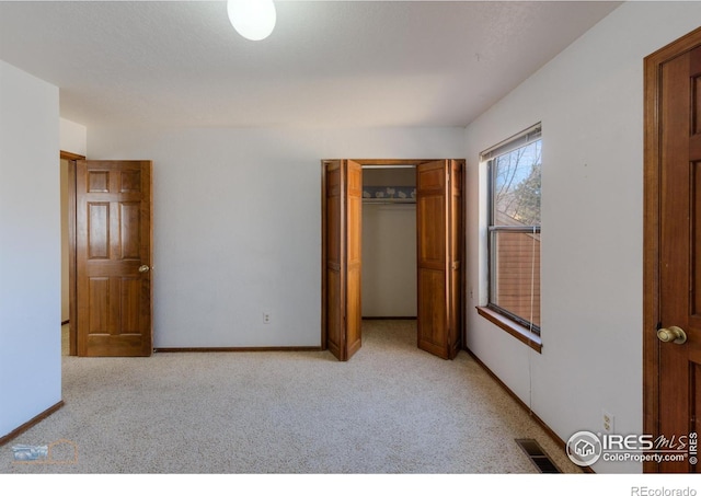 3076 Fulton Cir, Boulder, CO 80301 - unfurnished bedroom with light colored carpet and a closet