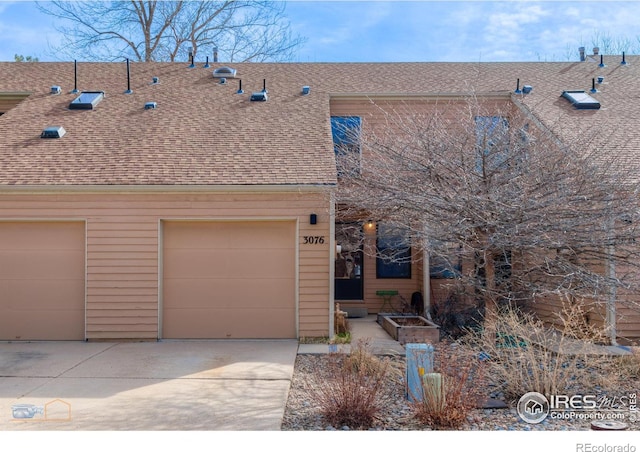3076 Fulton Cir, Boulder, CO 80301 - view of front facade with concrete driveway and roof with shingles
