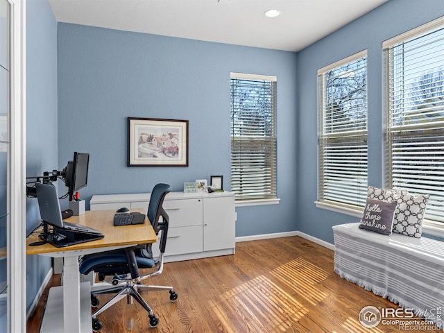 home office with recessed lighting, baseboards, and wood finished floors