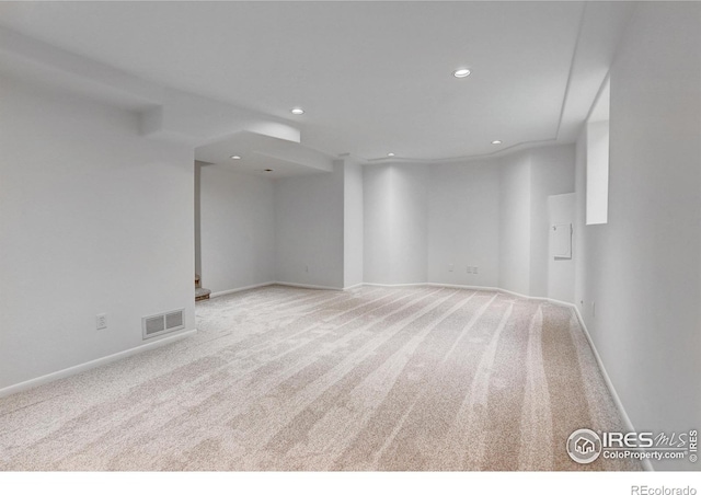 10895 W Half Moon Pass, Littleton, CO 80127 - spare room featuring light colored carpet, recessed lighting, and baseboards