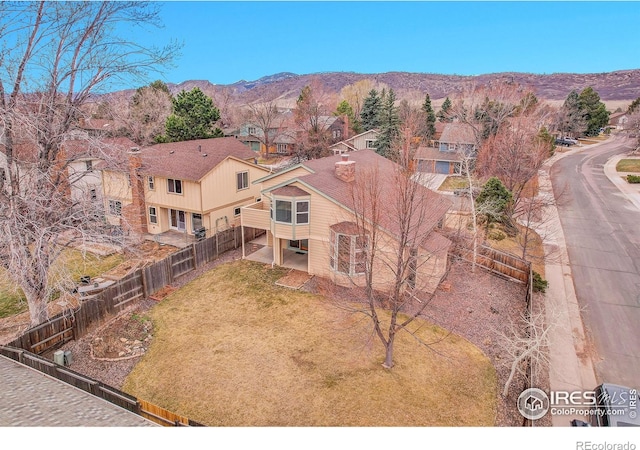 10895 W Half Moon Pass, Littleton, CO 80127 - aerial view of residential area featuring a mountainous background