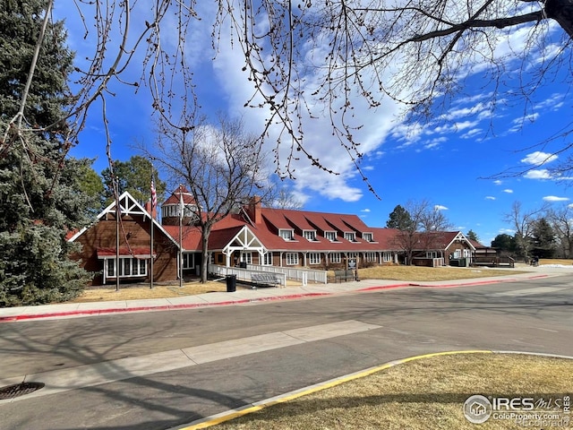 10895 W Half Moon Pass, Littleton, CO 80127 - view of asphalt street with curbs and sidewalks