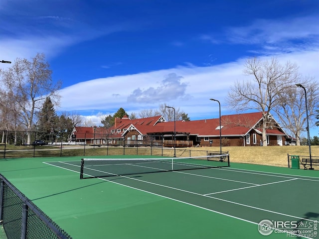 10895 W Half Moon Pass, Littleton, CO 80127 - view of tennis court featuring community basketball court