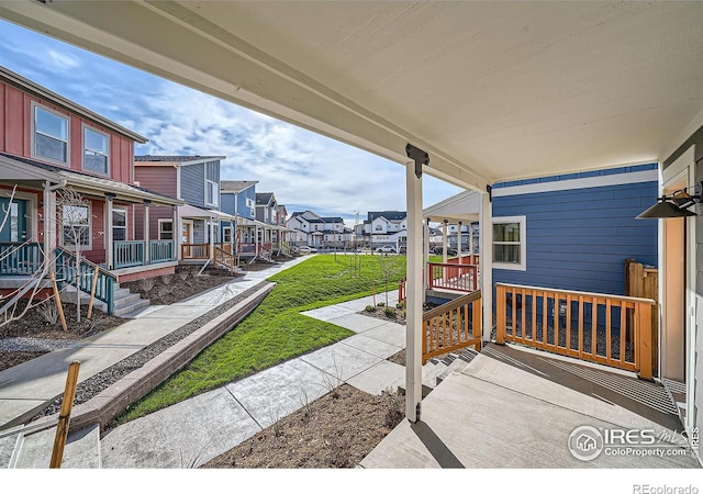 view of patio featuring a residential view and covered porch