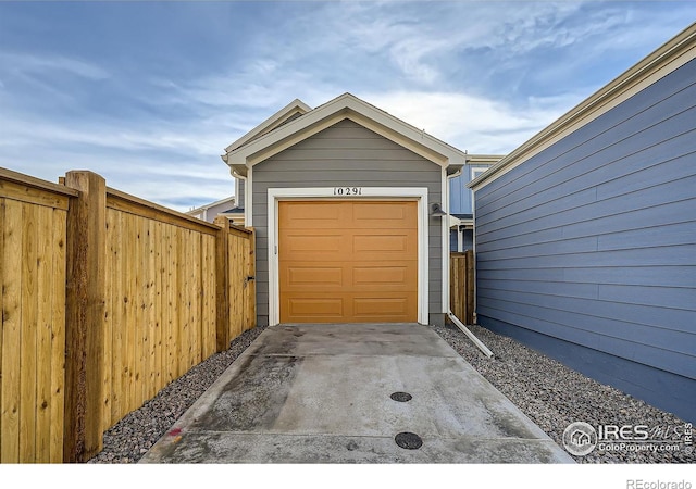 garage featuring fence
