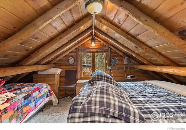 bedroom with wood ceiling, lofted ceiling with beams, and rustic walls