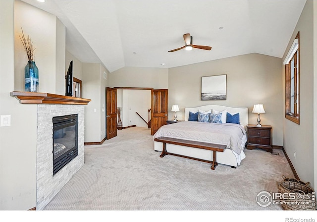 bedroom with lofted ceiling, a brick fireplace, carpet, and baseboards