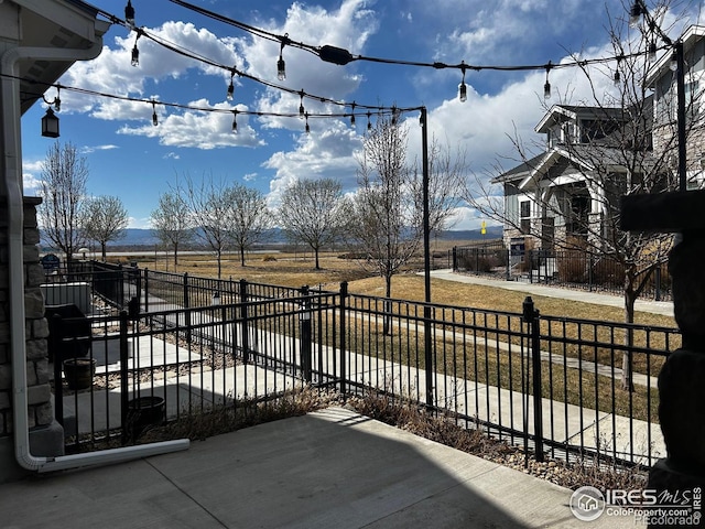 2453 Trio Falls Dr, Loveland, CO 80538 - view of patio / terrace with fence