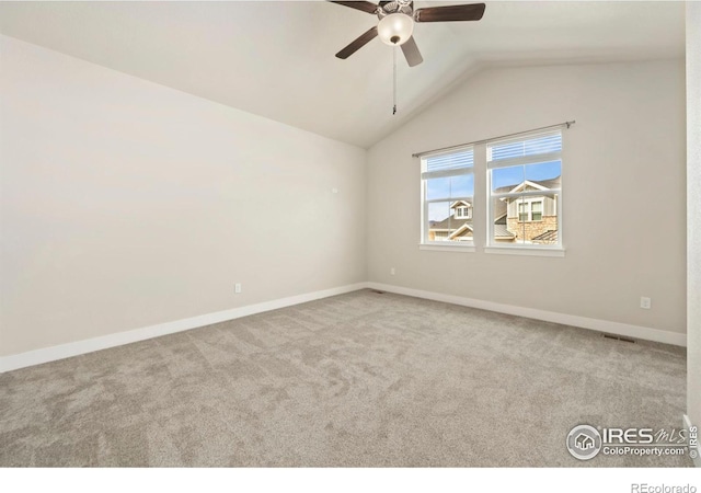 2453 Trio Falls Dr, Loveland, CO 80538 - unfurnished room with ceiling fan, lofted ceiling, carpet flooring, and baseboards