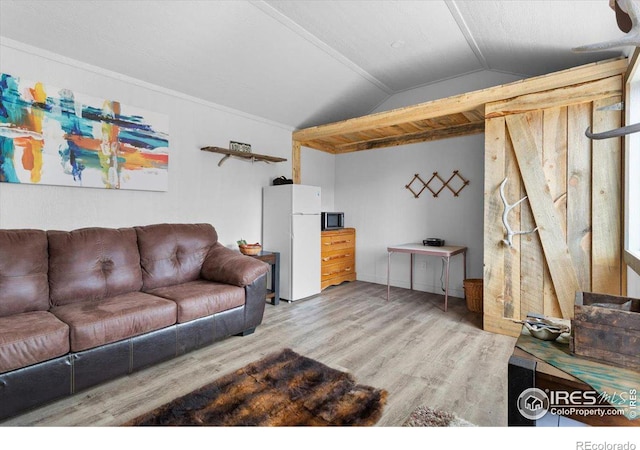 59 W Rustic Rd, Bellvue, CO 80512 - living room featuring wood finished floors and vaulted ceiling