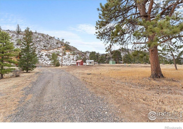 59 W Rustic Rd, Bellvue, CO 80512 - view of yard featuring a mountain view