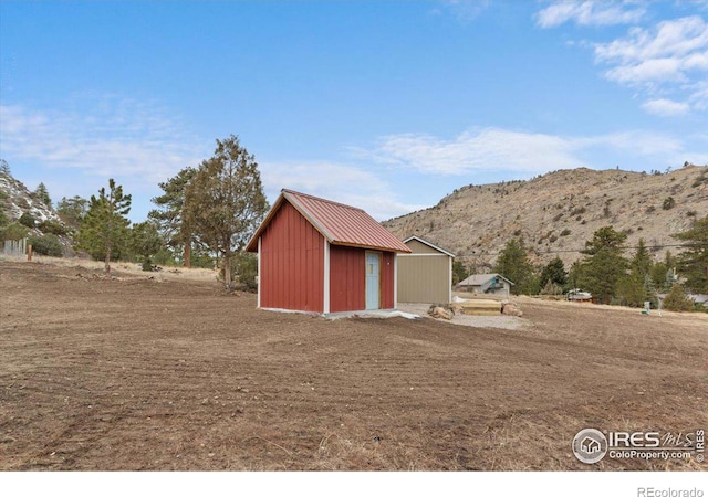 59 W Rustic Rd, Bellvue, CO 80512 - view of shed with a mountain view