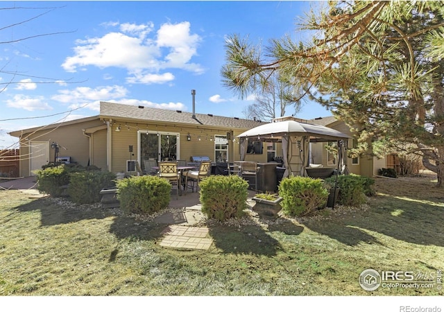 5621 W 27th St, Greeley, CO 80634 - rear view of property with a gazebo and a patio area