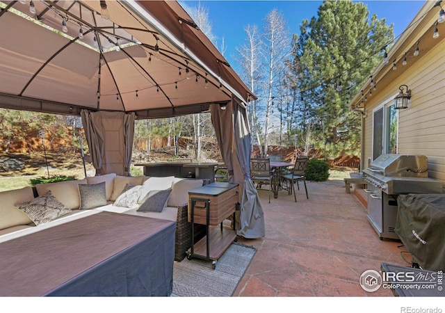 5621 W 27th St, Greeley, CO 80634 - view of patio / terrace with a gazebo, an outdoor living space, area for grilling, and outdoor dining area