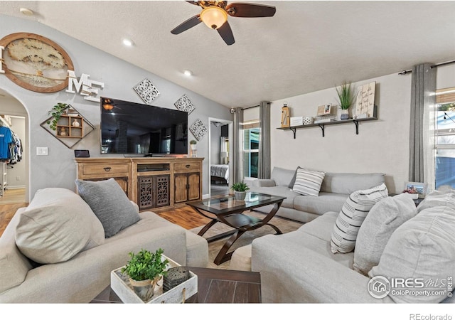 5621 W 27th St, Greeley, CO 80634 - living area with plenty of natural light, wood finished floors, a ceiling fan, and vaulted ceiling