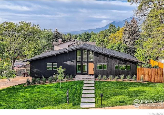 1580 Moss Rock Pl, Boulder, CO 80304 - mid-century modern home featuring a mountain view
