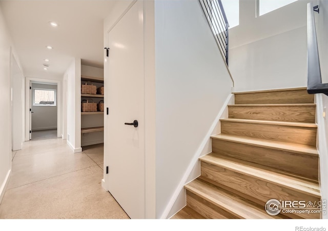 1580 Moss Rock Pl, Boulder, CO 80304 - stairs with baseboards and recessed lighting