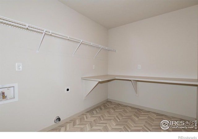 1047 Spartan Ave, Berthoud, CO 80513 - laundry area with electric dryer hookup, washer hookup, and laundry area
