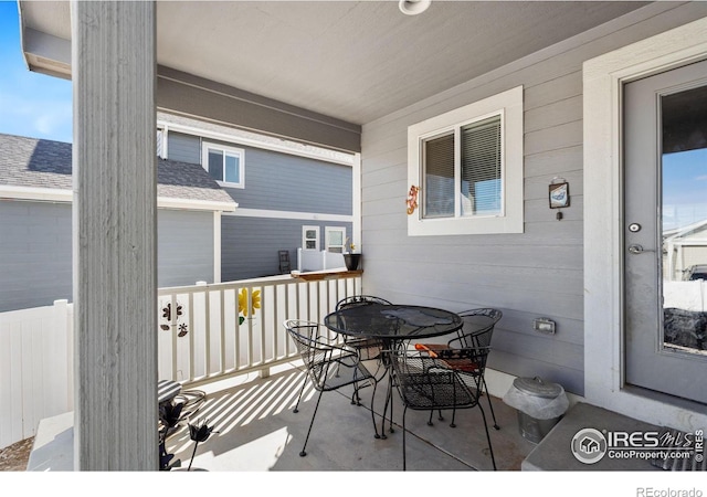 balcony featuring outdoor dining space