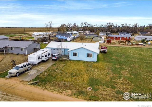 562 E St, Hillrose, CO 80733 - birds eye view of property featuring a residential view