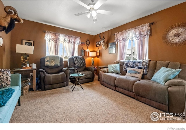 562 E St, Hillrose, CO 80733 - carpeted living room featuring ceiling fan
