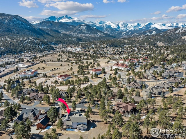 bird's eye view featuring a mountain view and a residential view