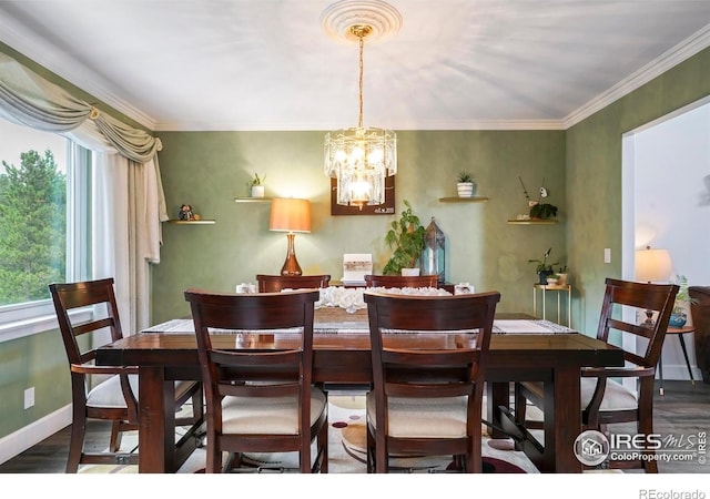 12023 Coal Creek Heights Dr, Golden, CO 80403 - dining room featuring crown molding, baseboards, wood finished floors, and a notable chandelier