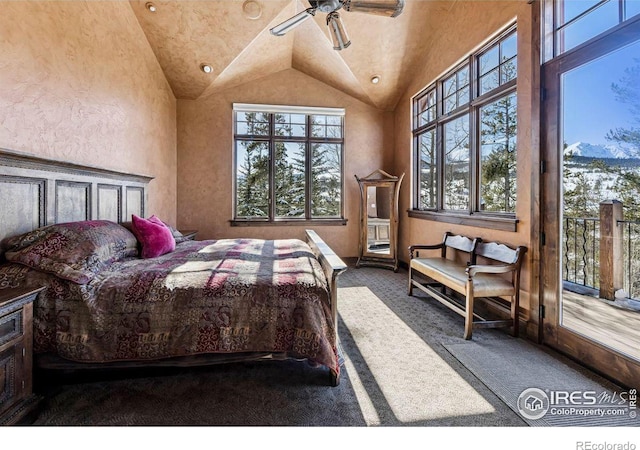 bedroom featuring access to exterior, carpet flooring, ceiling fan, and lofted ceiling