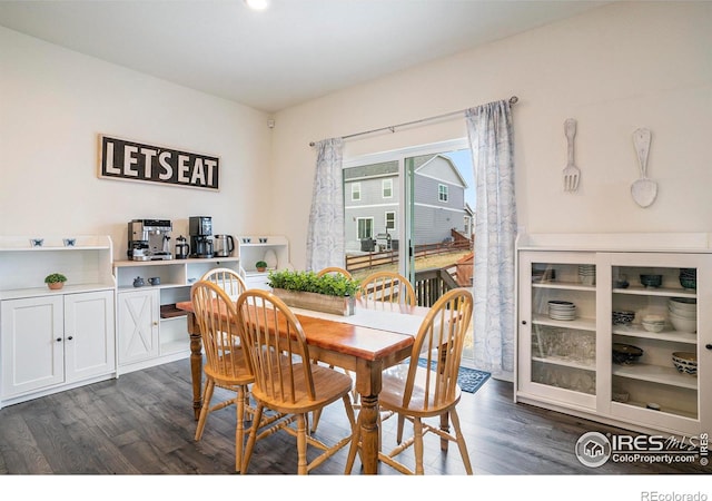 254 Ptarmigan Ln, Johnstown, CO 80534 - dining room with dark wood-style flooring