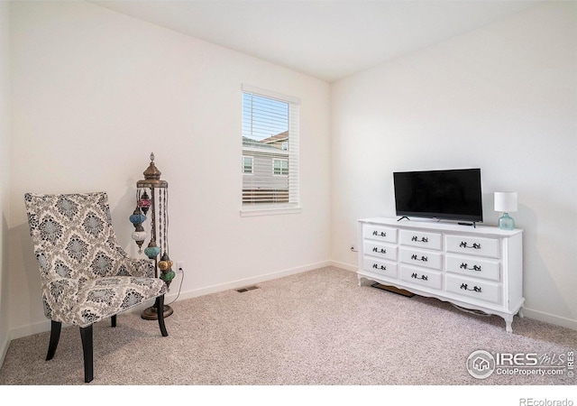 254 Ptarmigan Ln, Johnstown, CO 80534 - sitting room with light carpet and baseboards
