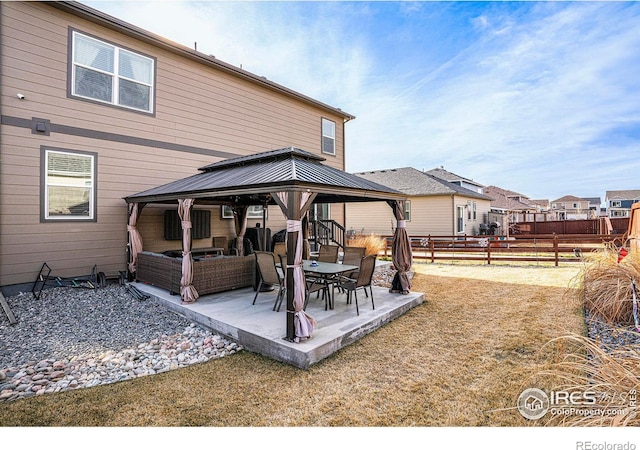 254 Ptarmigan Ln, Johnstown, CO 80534 - back of property with a gazebo, a patio, and an outdoor hangout area
