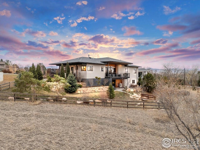 exterior space featuring a patio, fence private yard, and stucco siding