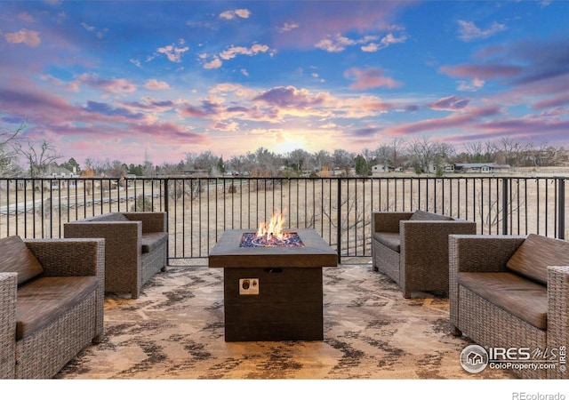 view of patio / terrace featuring a fire pit