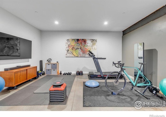 exercise area featuring recessed lighting